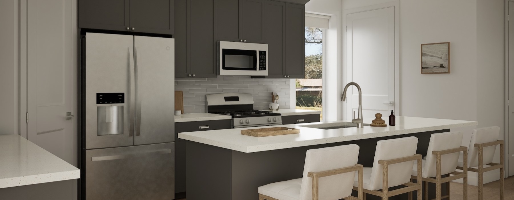 a kitchen with an island and chairs
