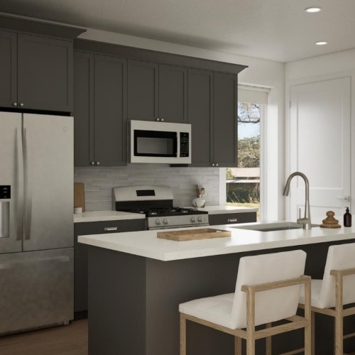a kitchen with a table and chairs
